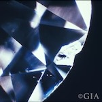 Chip: a nick found usually at the edge of the gem.