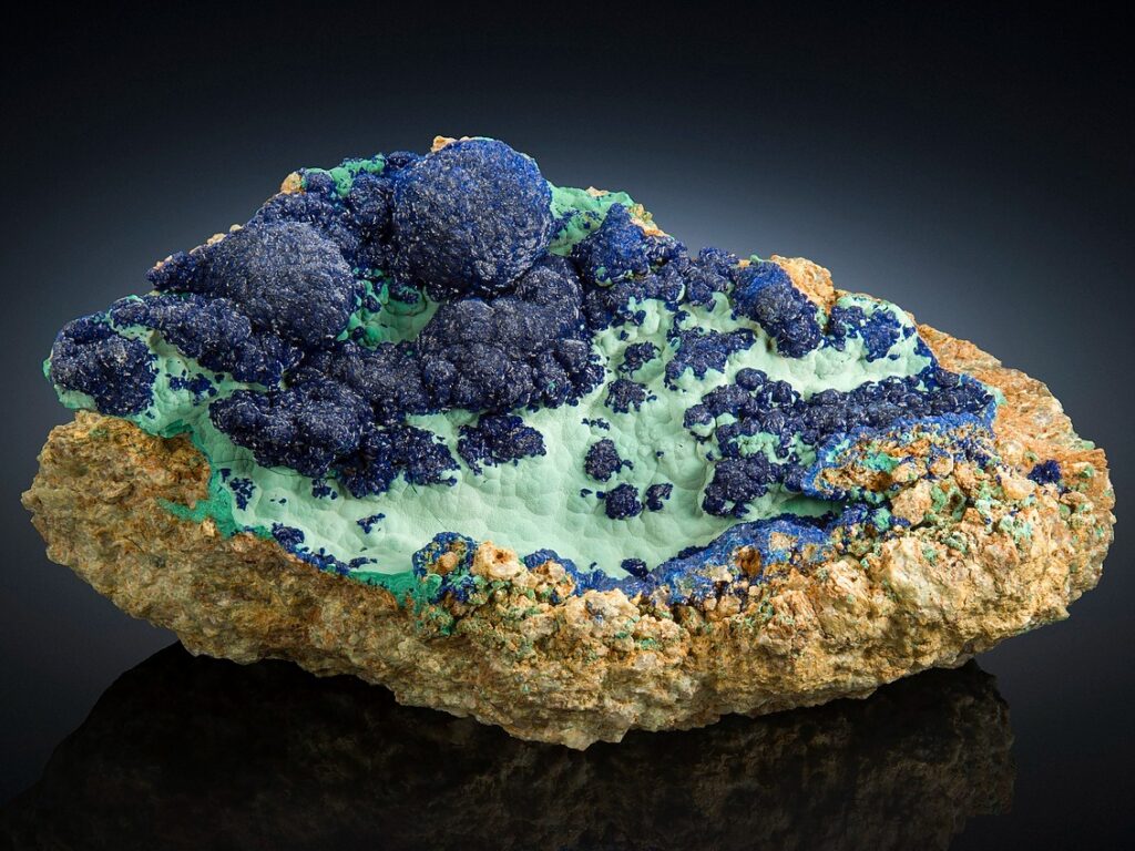 Deep blue azurite and green malachite on matrix rock.
