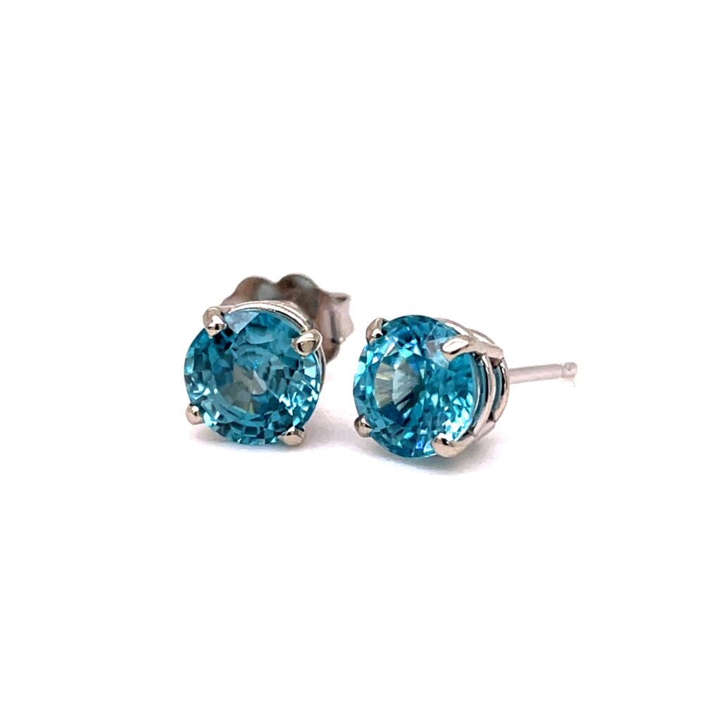 A pair of brilliant round-cut blue zircon stud earrings