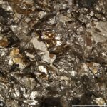 RRUFF Project Specimen ID: R060144 Locality: Worthington, Ontario, Canada Source: University of Arizona Mineral Museum 5840 Bronze-white metallic massive