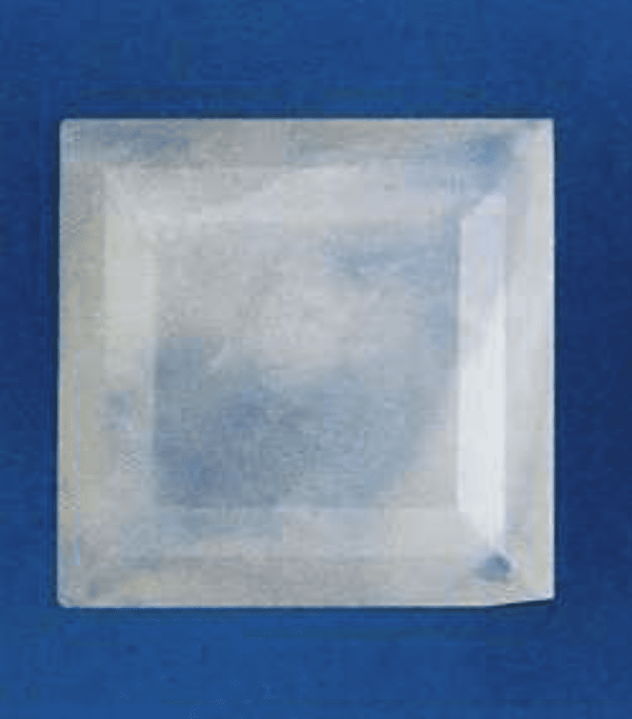 Faceted xonotlite (about 2 carats): Laghi di Posina, Vicenza, Italy.
